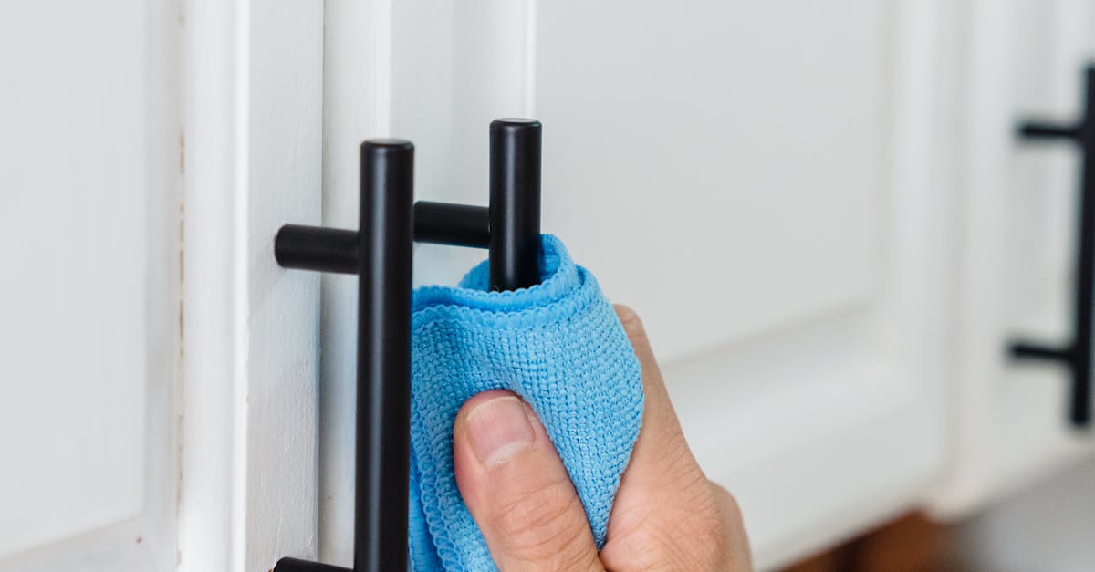 How do you deep clean inside kitchen cabinets?